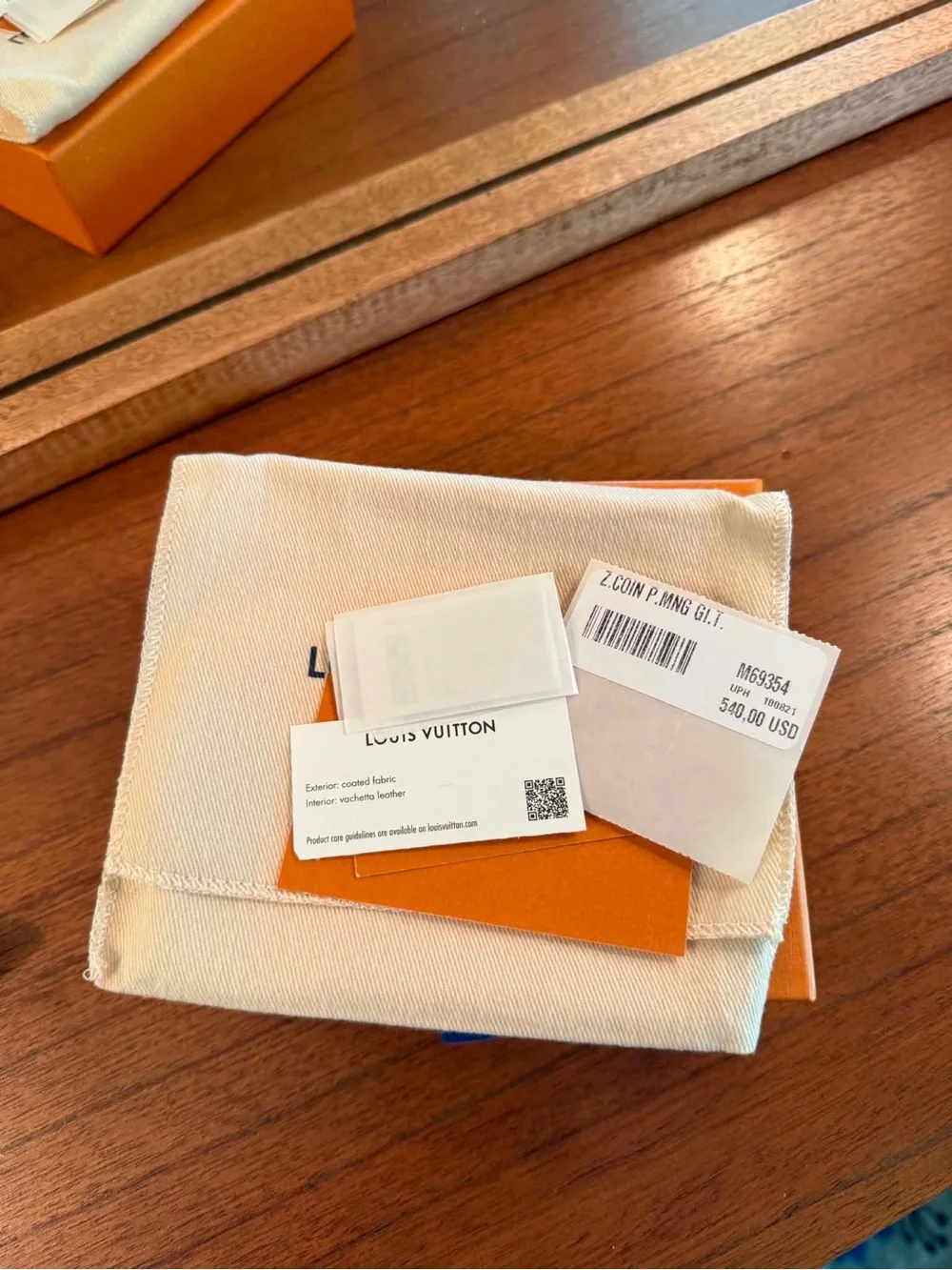 Louis Vuitton Zippy coin purse.